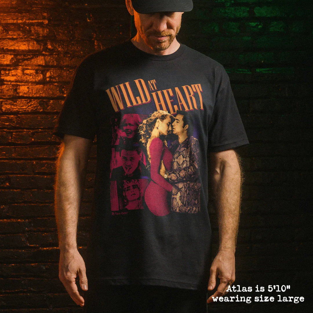 Male model wear soft premium tee with wild at heart graphic
