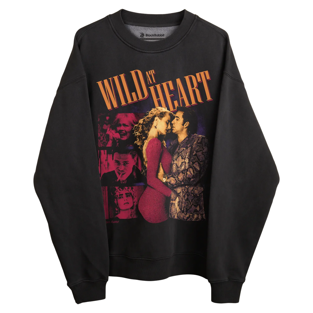 Black sweatshirt with ’wild at heart’ graphic design featuring characters from the movie.