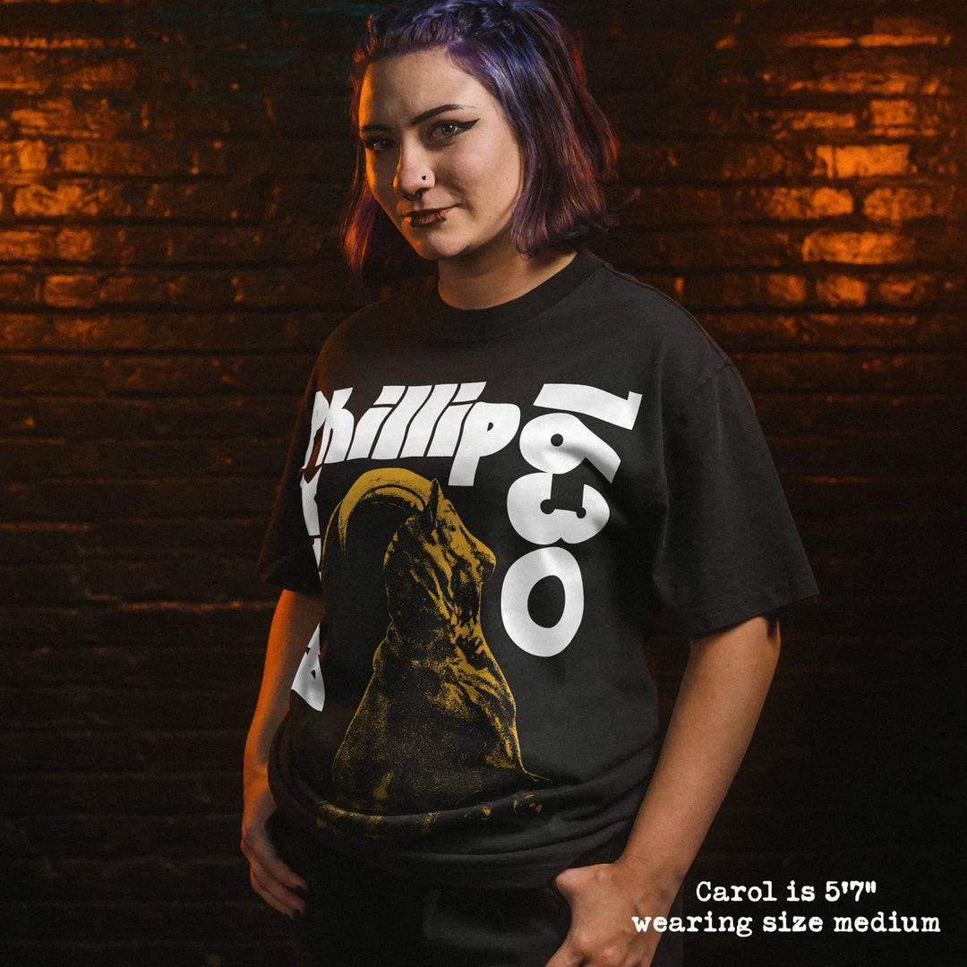 Model wearing heavy tee with black phillip sabbath graphic 