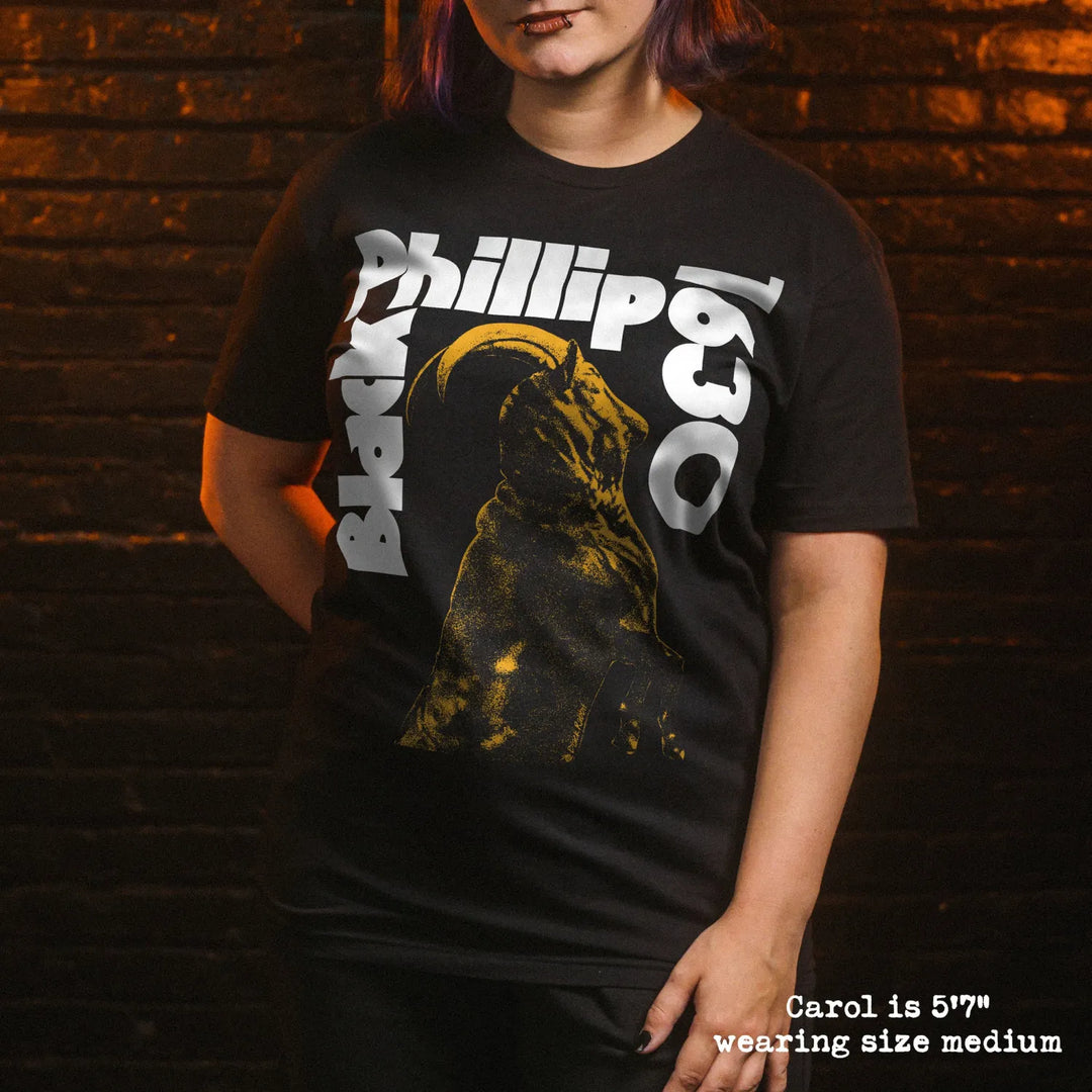 Model wearing black premium tee with black phillip graphic 