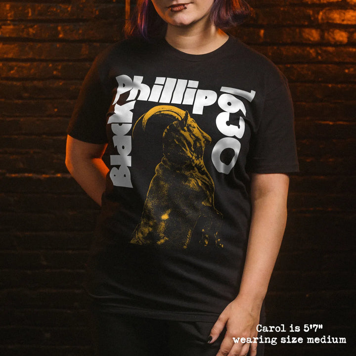Model wearing black premium tee with black phillip graphic 