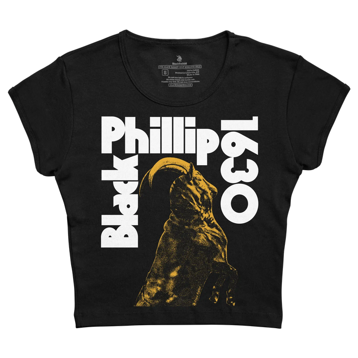 Black short-sleeved crop top featuring a bold white ’black phillip 1630’’ graphic with a stylized golden goat illustration.
