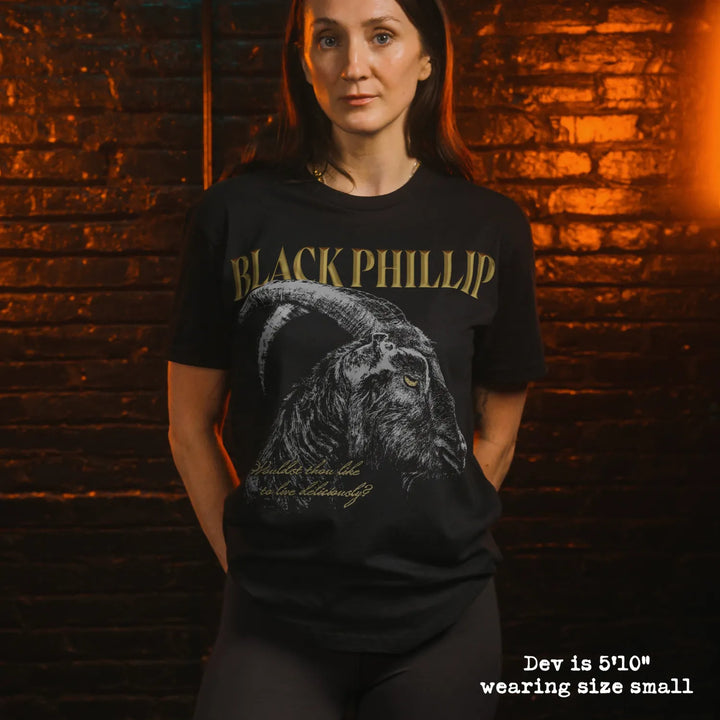 Model wearing black premium tee with black phillip graphic 