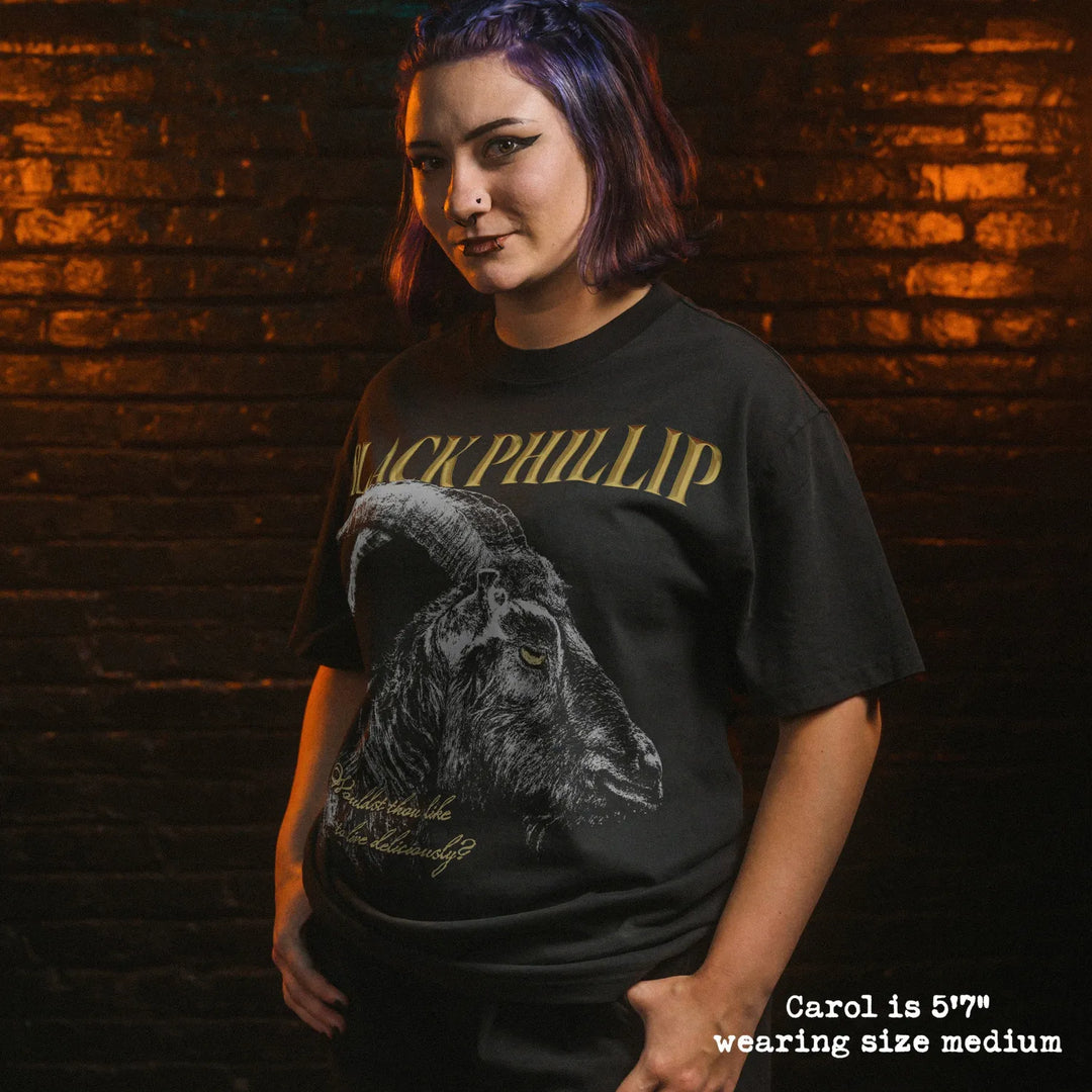 Model wearing faded black heavy tee with black phillip graphic 