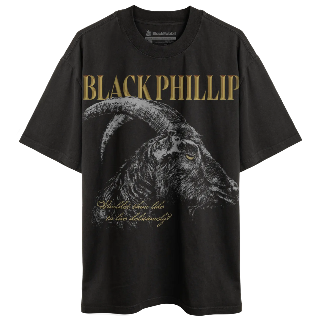 Black T-shirt with a detailed illustration of a goat and gold text.