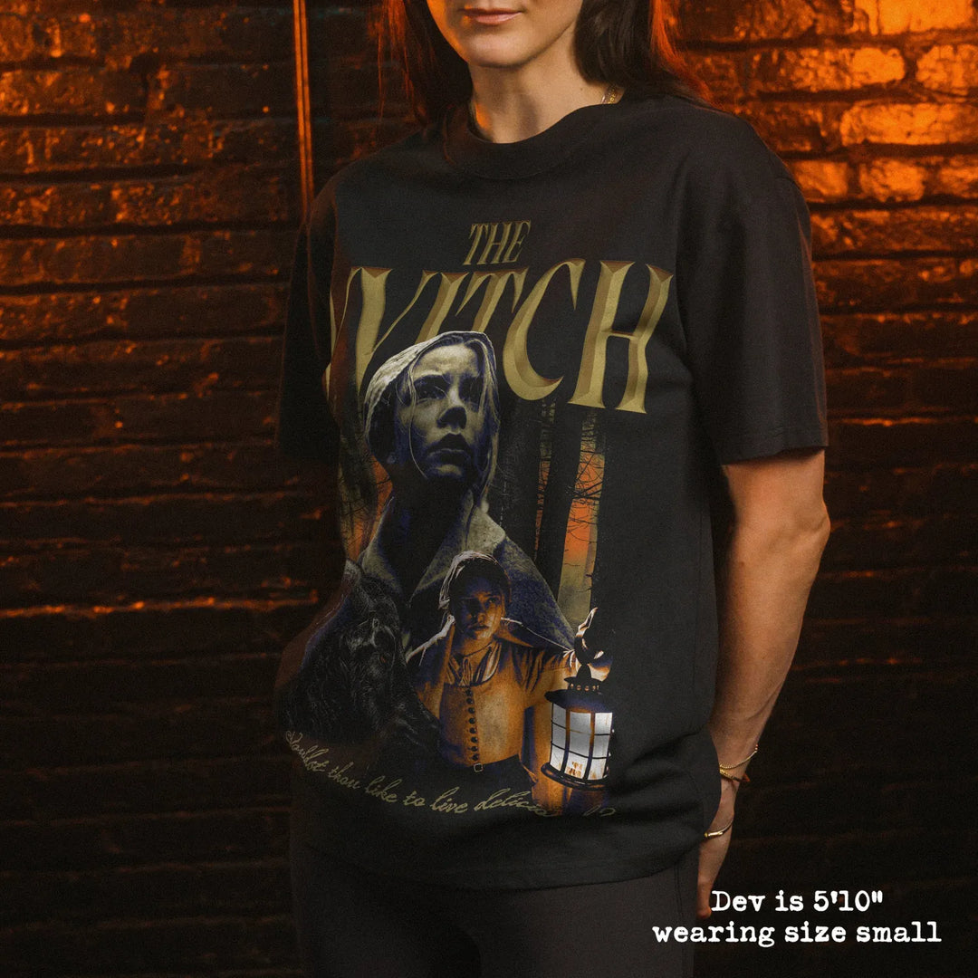 Model wearing heavy tee with the witch graphic 
