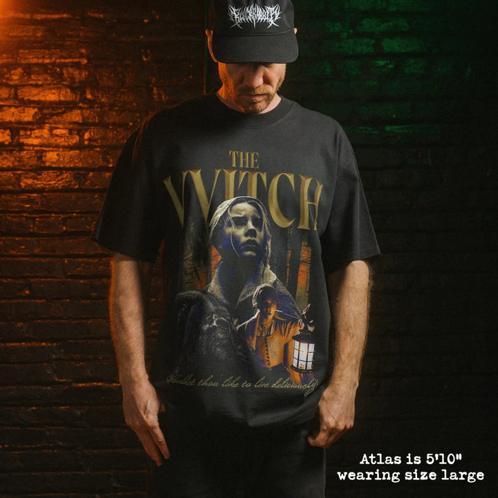 Model wearing heavy tee with the witch graphic 