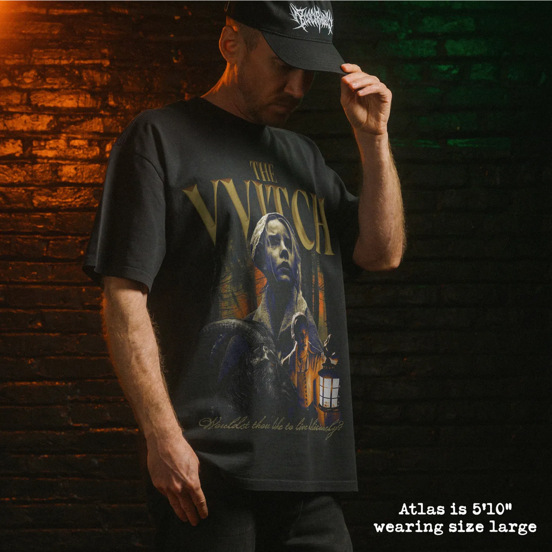 Model wearing heavy tee with the witch graphic 