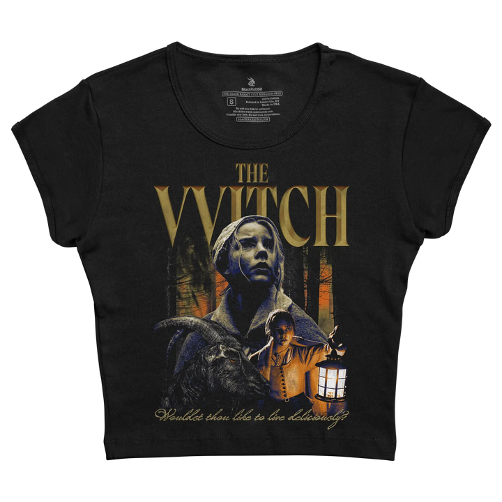 Black short-sleeved t-shirt featuring a graphic print of ’the witch’ movie poster with gold lettering and imagery.