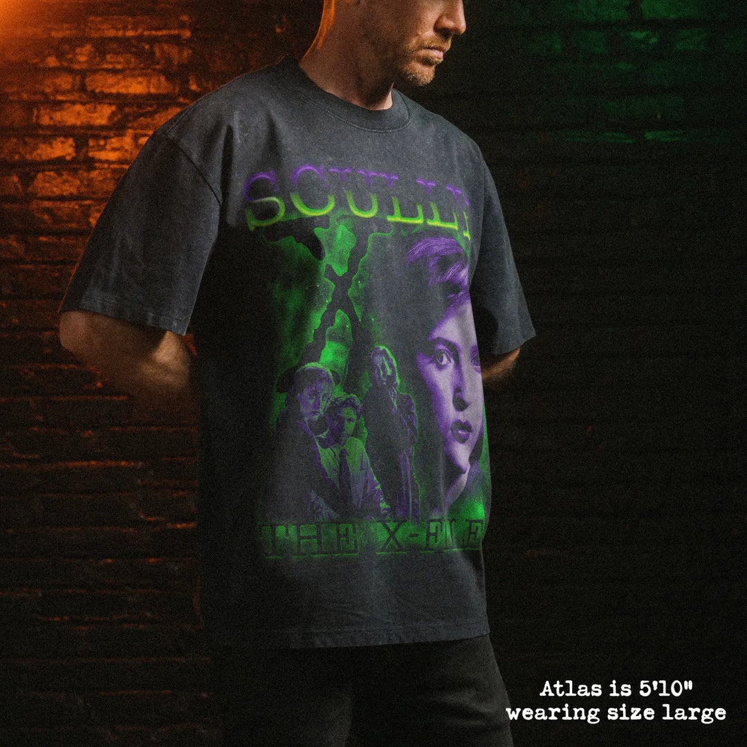 Male model wearing stone wash heavy tee with scully graphic 