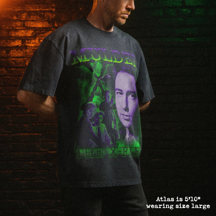 Male model wearing stone wash heavy tee with mulder graphic 
