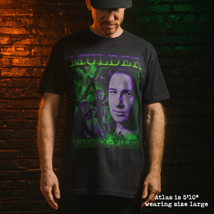 Male model wear soft premium tee with mulder graphic
