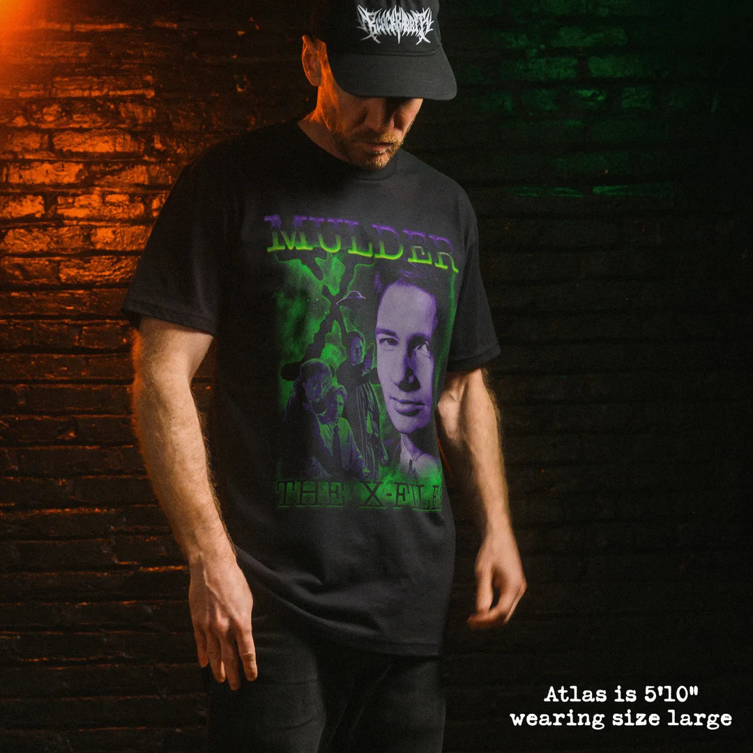 Male model wear soft premium tee with Mulder graphic
