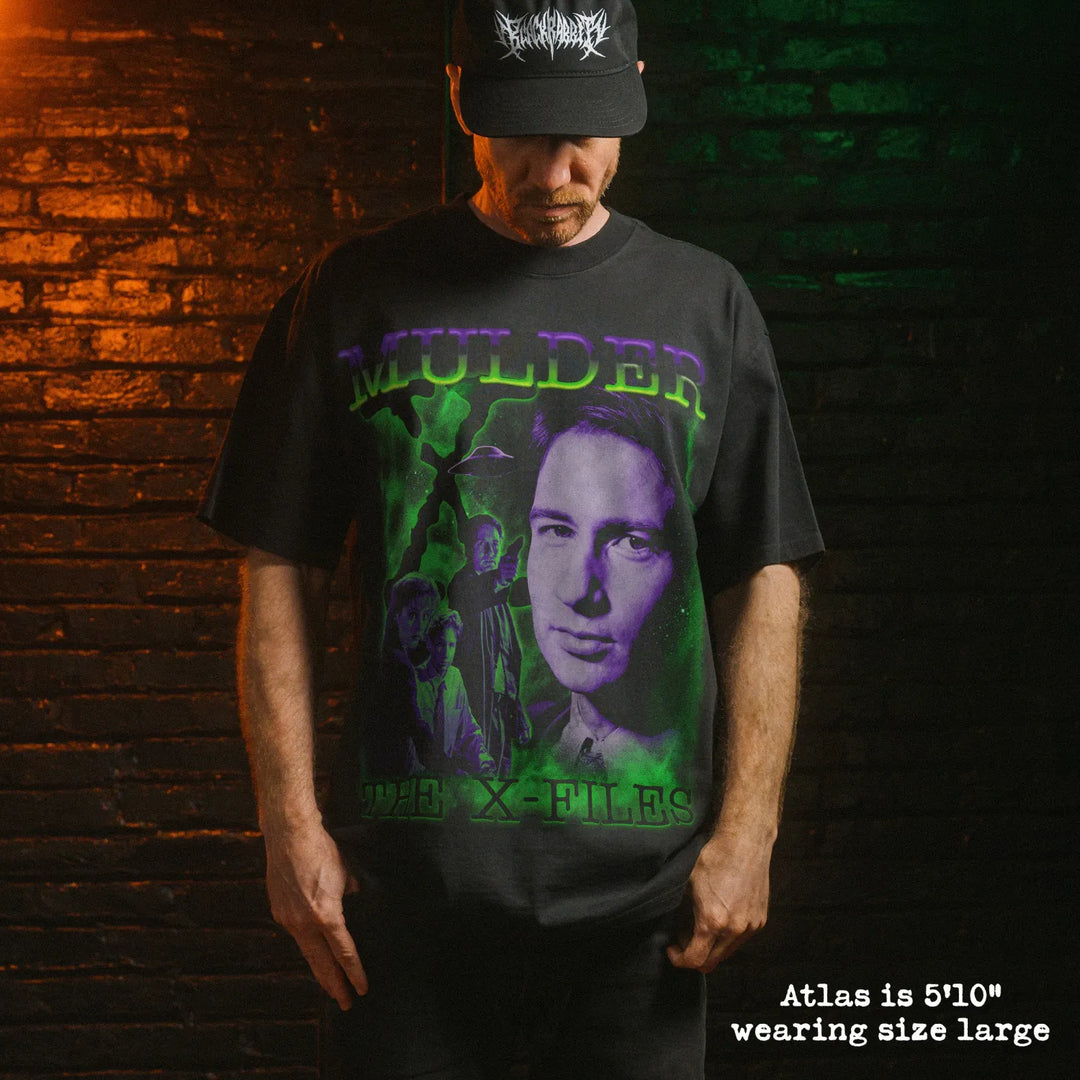 Model wearing heavy tee with mulder graphic 