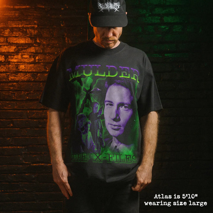 Model wearing heavy tee with mulder graphic 