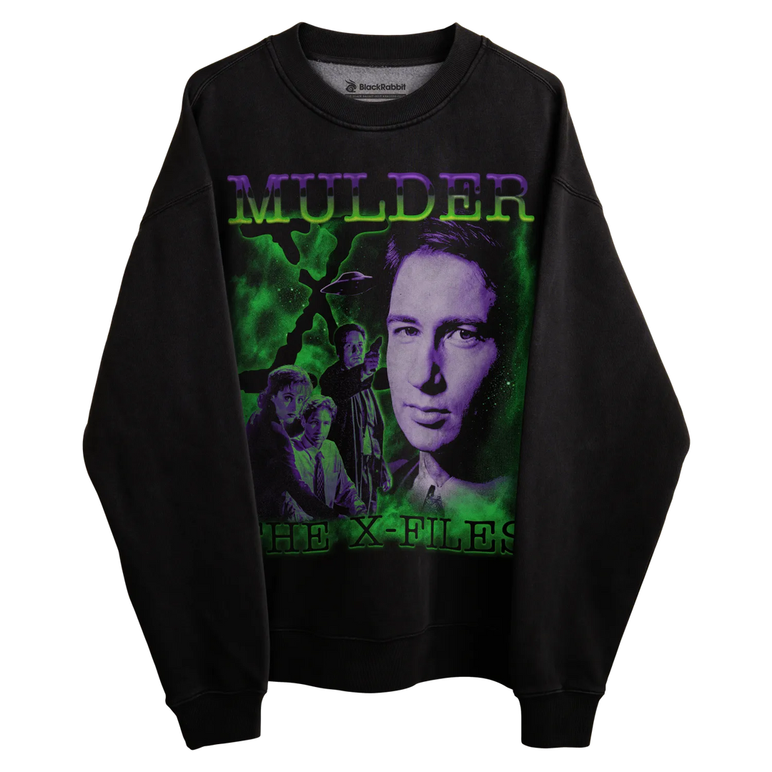 Black crewneck sweatshirt with ’mulder’ and ’the x-files’ design, featuring green and purple text.