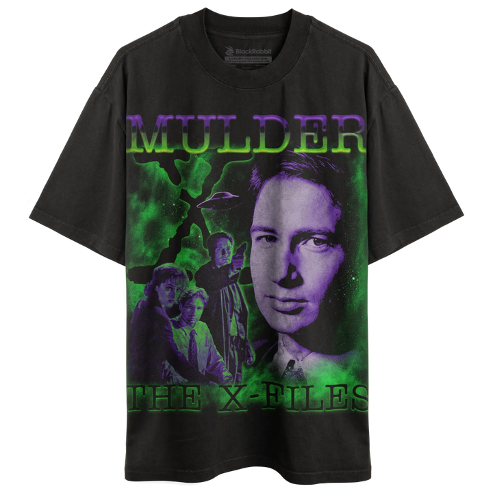Black t-shirt with a green and purple graphic print of ’Mulder’ from The X-Files.