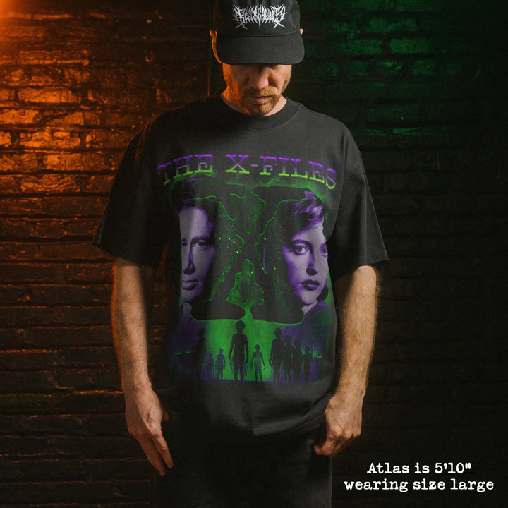 Model wearing heavy tee with x files graphic 