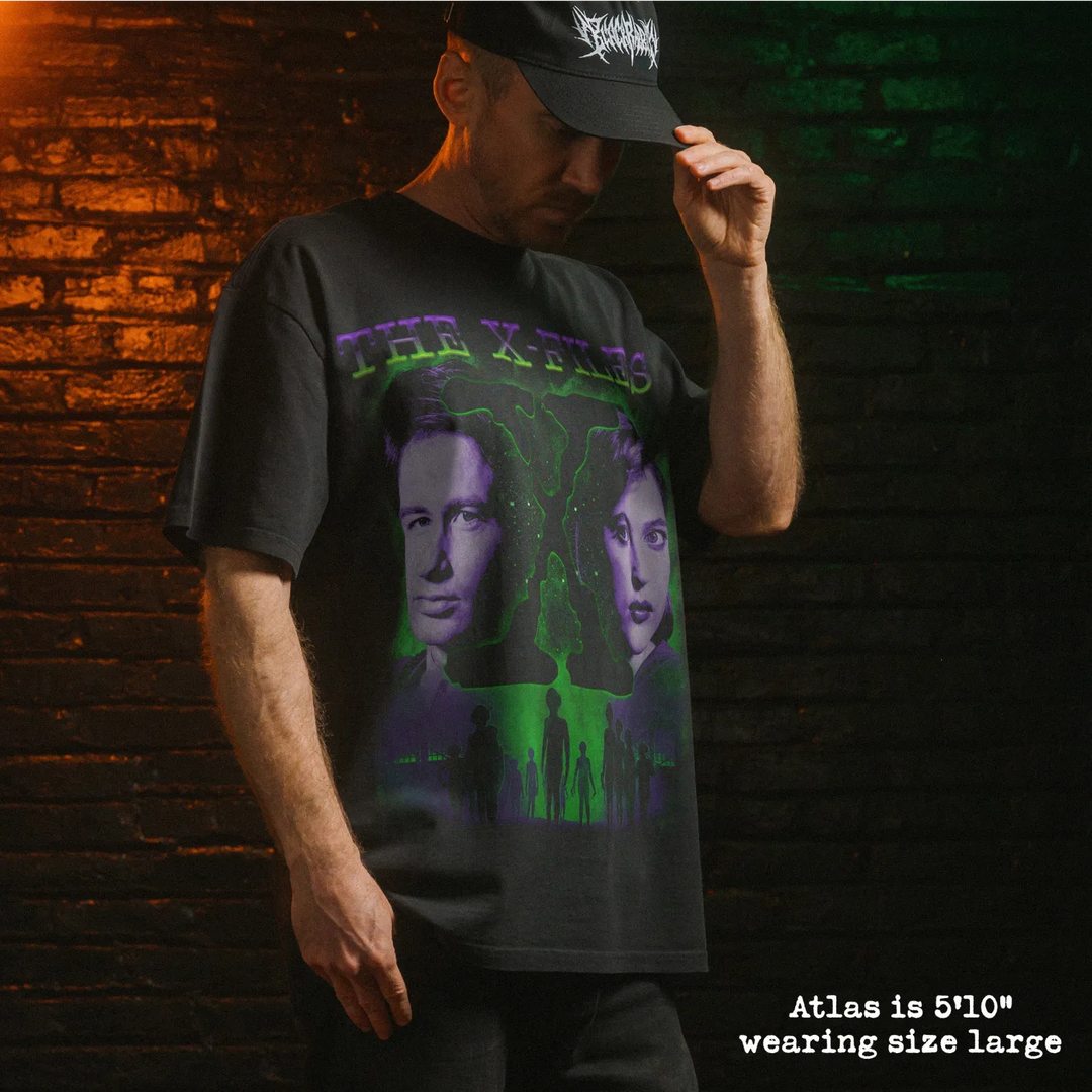 Model wearing heavy tee with x-files graphic 