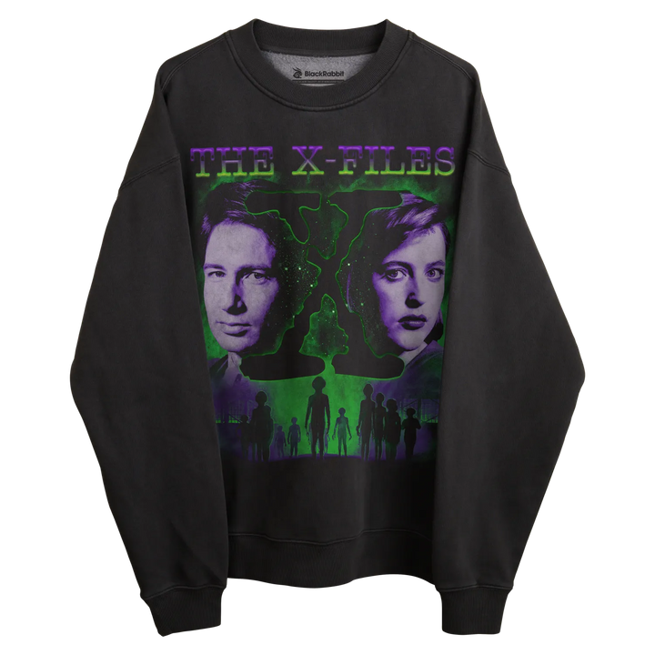 Black crewneck sweatshirt with ’the x-files’ graphic featuring mulder and scully, green alien silhouette, purple text.
