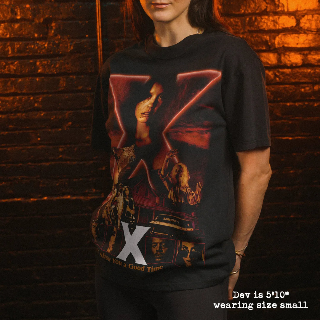 Model wearing heavy tee with X graphic 
