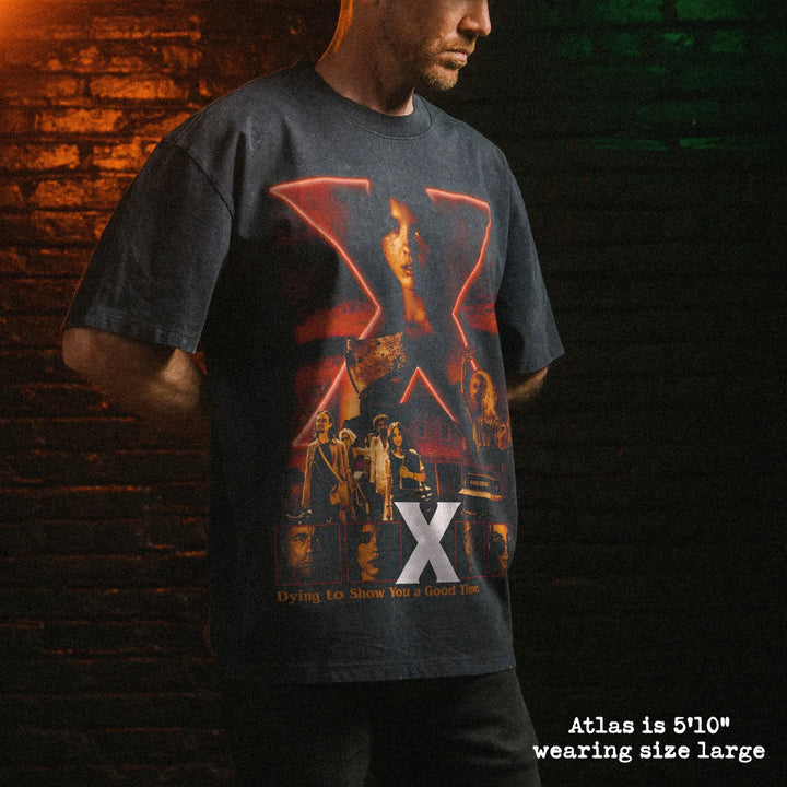 Male model wearing stone wash heavy tee with X graphic 