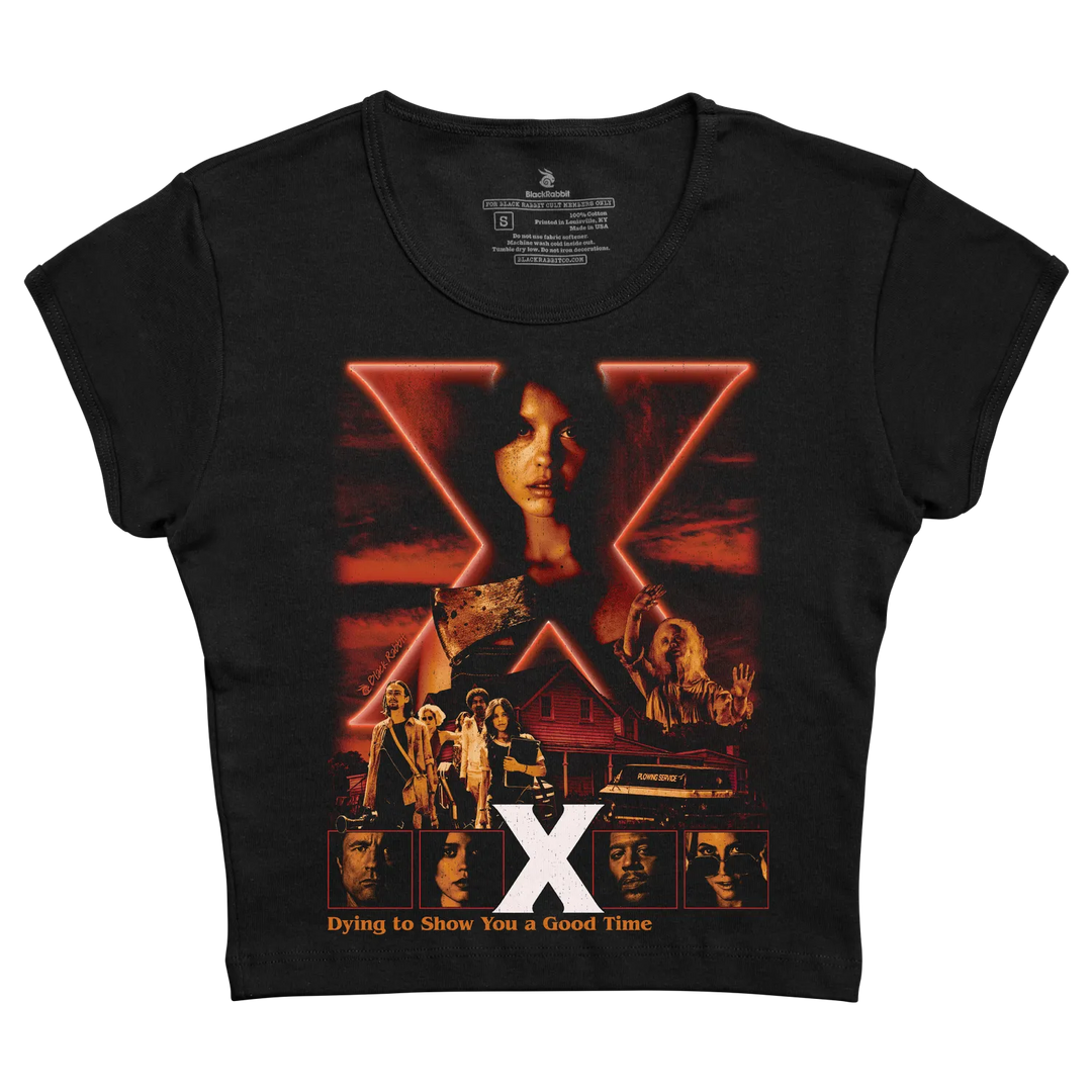 Black short-sleeved t-shirt featuring a graphic print of the movie ’x’ with red neon-style lettering and character images.