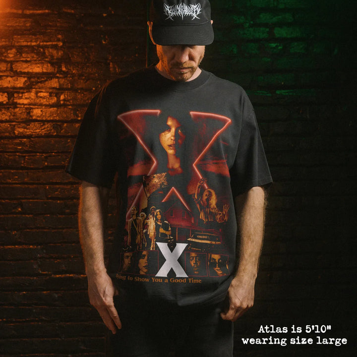 Model wearing heavy tee with X graphic 